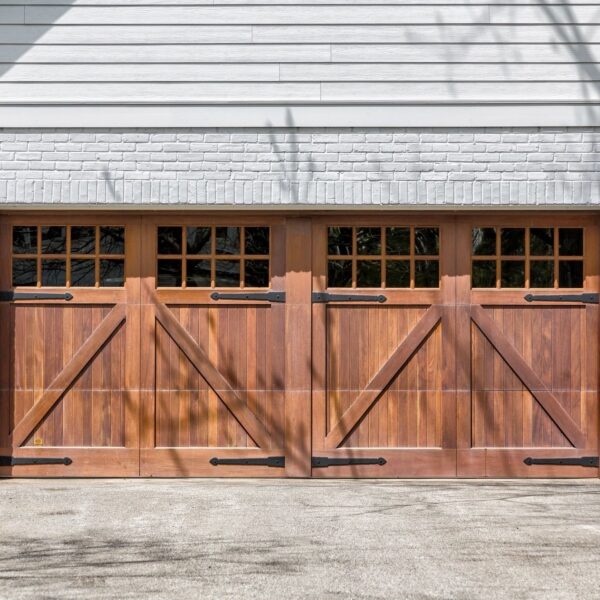 Garage door service team repairing a door in Rocklin, CA